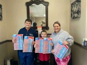 TOOTHBRUSH DONATIONS AT DALLAS DENTAL SMILES.