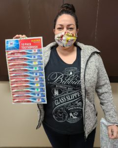 TOOTHBRUSH DONATIONS AT DALLAS DENTAL SMILES.