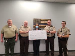 Dallas Dental Smiles Donating for Cops For kids Event