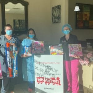 Dallas Dental Smiles Team Collecting Toys For the Community Event